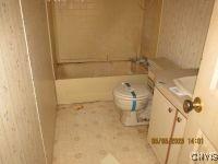 111 Maple Ave, Augusta, NY 13425 - full bathroom featuring toilet, tub / shower combination, and vanity
