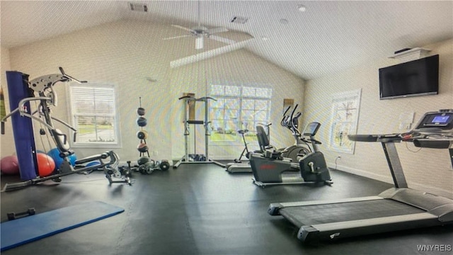 workout area featuring lofted ceiling and visible vents