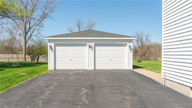 detached garage with fence