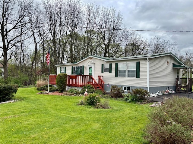 397 Jerrysmith Rd, Lansing, NY 14850 - view of front of property featuring a deck and a front yard