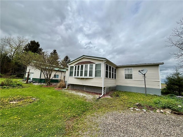 397 Jerrysmith Rd, Lansing, NY 14850 - rear view of property with a lawn