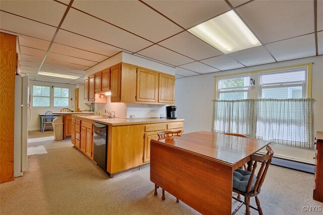 18 Crossmon St, Alexandria, NY 13607 - kitchen featuring freestanding refrigerator, light countertops, black dishwasher, and a drop ceiling