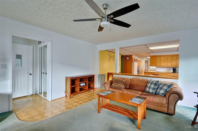 18 Crossmon St, Alexandria, NY 13607 - living area with baseboards and ceiling fan