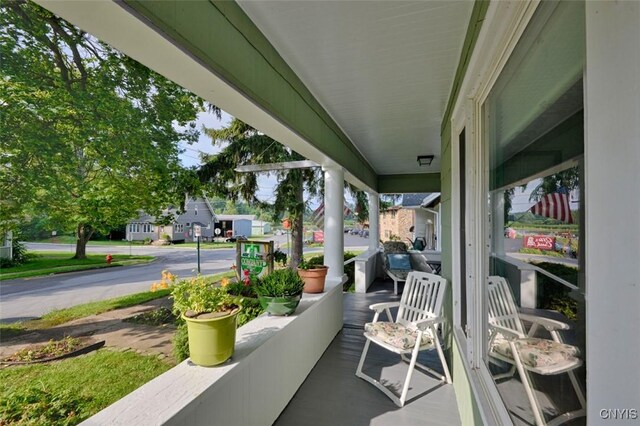 18 Crossmon St, Alexandria, NY 13607 - view of patio / terrace featuring a porch