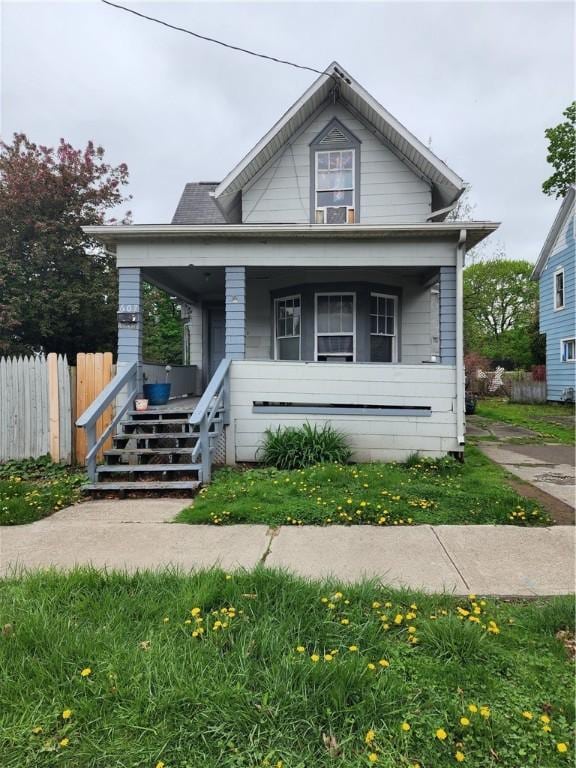 607 Walnut St, Elmira-City, NY 14901 - bungalow-style house with covered porch and fence