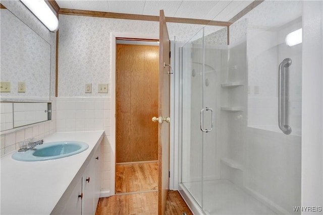 9862 Rte 219, Ashford, NY 14171 - bathroom with crown molding, a shower stall, and wood finished floors