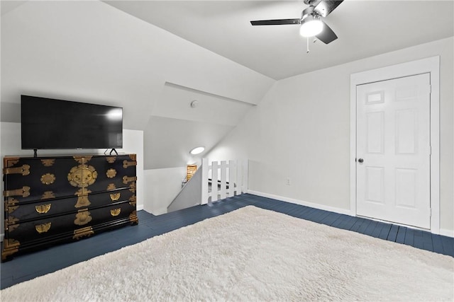 bonus room with vaulted ceiling, baseboards, and ceiling fan