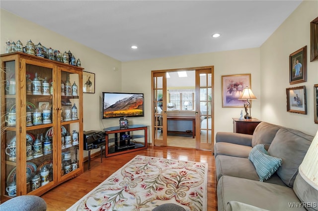 living area featuring recessed lighting and wood finished floors