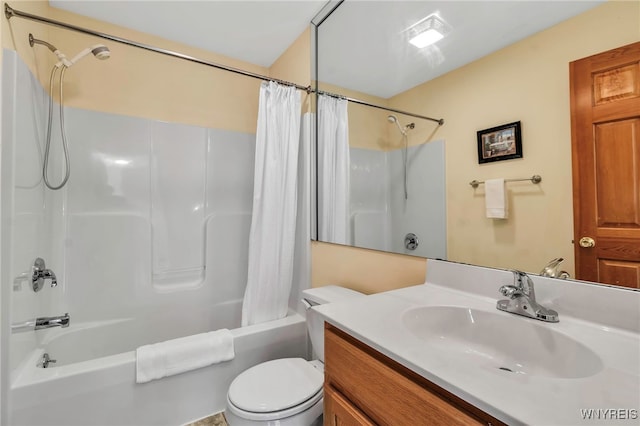 bathroom featuring vanity, toilet, and shower / bath combo