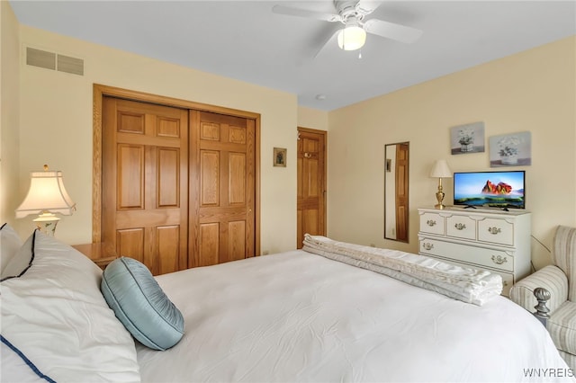 bedroom with a ceiling fan, a closet, and visible vents