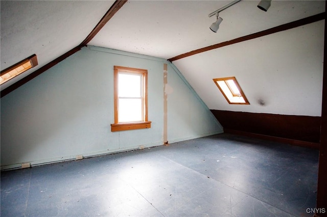 additional living space with lofted ceiling