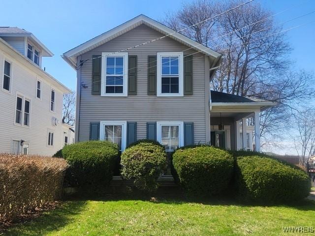 106 Saxton St, Lockport City, NY 14094 - view of front facade featuring a front yard