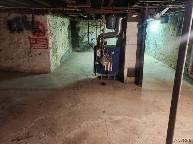 106 Saxton St, Lockport City, NY 14094 - unfinished below grade area featuring a heating unit
