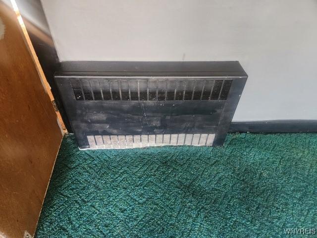 106 Saxton St, Lockport City, NY 14094 - room details featuring heating unit