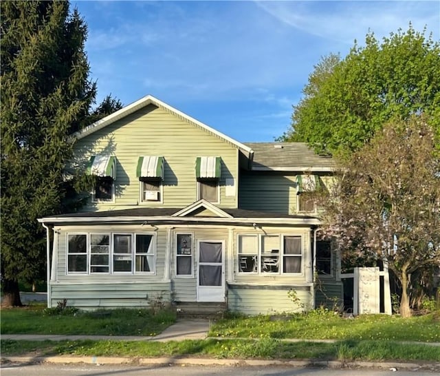 traditional-style home with entry steps
