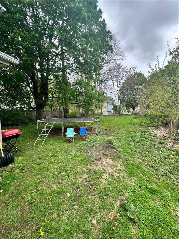 view of yard with a trampoline