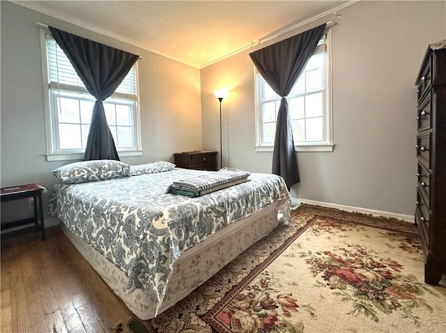 616 Hart St, Elmira-City, NY 14901 - bedroom featuring dark wood-style flooring, ornamental molding, baseboards, and multiple windows