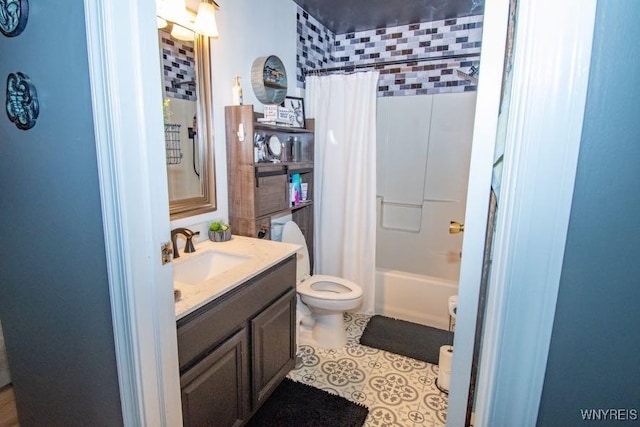 full bath with vanity, toilet, shower / bath combo with shower curtain, and tile patterned flooring