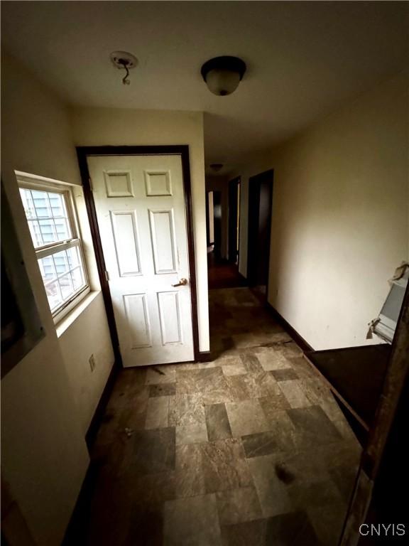 32 Spencer St, Gouverneur, NY 13642 - hallway with stone finish floors and baseboards