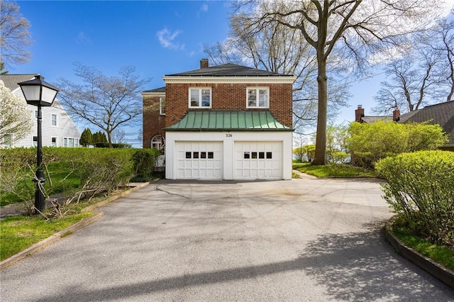 garage with driveway