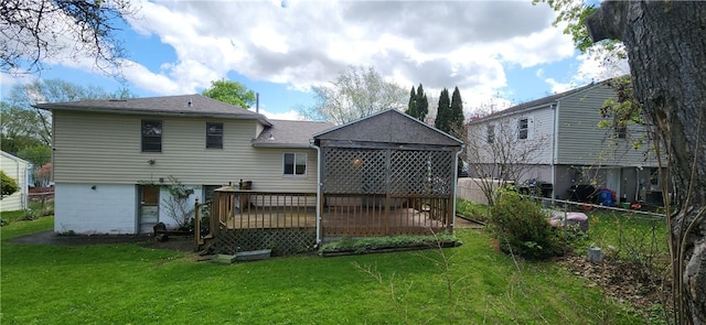 back of property featuring a wooden deck and a shingled roof