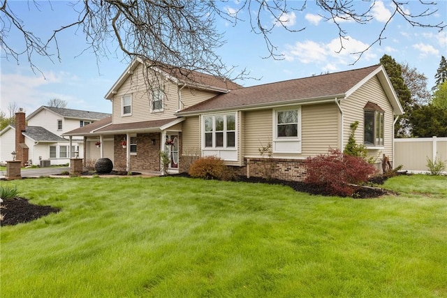 view of front of house featuring brick siding