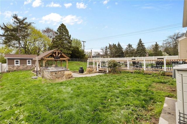 view of yard with a gazebo and a deck