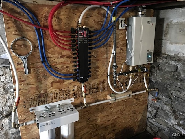 1270 W Belden Ave, Syracuse, NY 13204 - utility room featuring tankless water heater