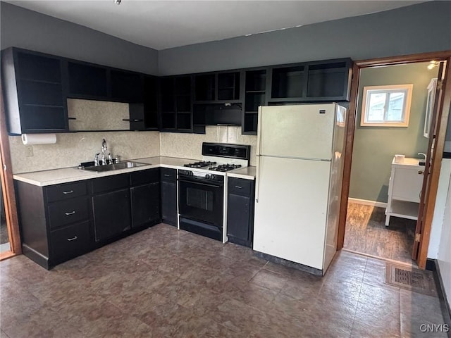 1270 W Belden Ave, Syracuse, NY 13204 - kitchen featuring freestanding refrigerator, open shelves, range with gas cooktop, and a sink