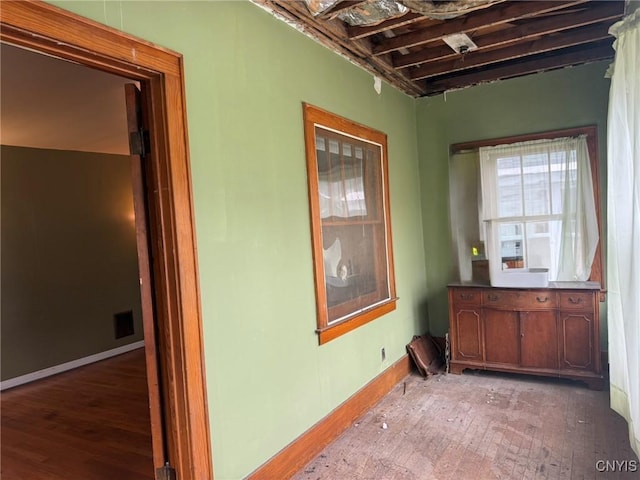 1270 W Belden Ave, Syracuse, NY 13204 - empty room featuring wood finished floors and baseboards