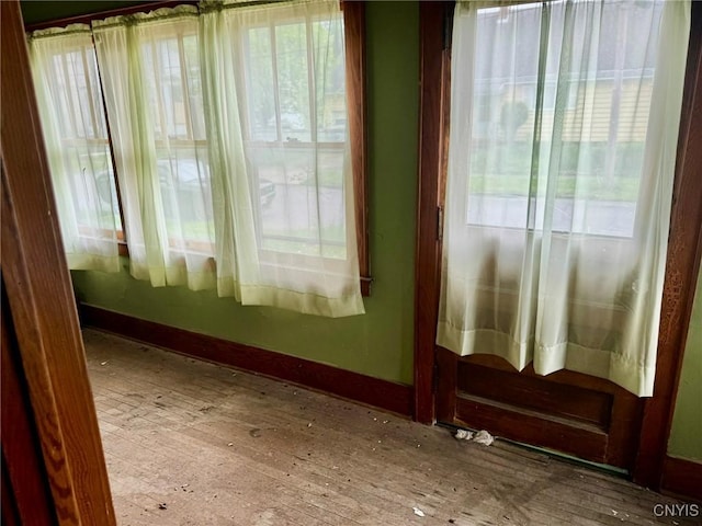 1270 W Belden Ave, Syracuse, NY 13204 - entryway featuring baseboards and hardwood / wood-style floors