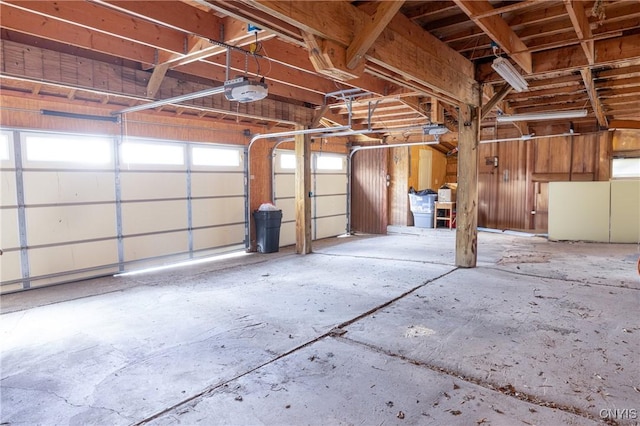 garage featuring a garage door opener