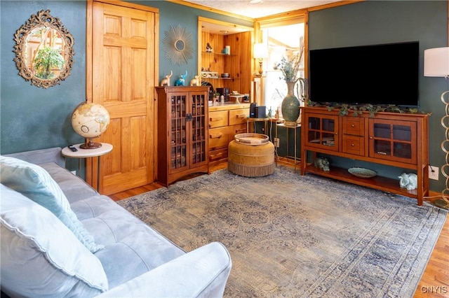 living area with wood finished floors