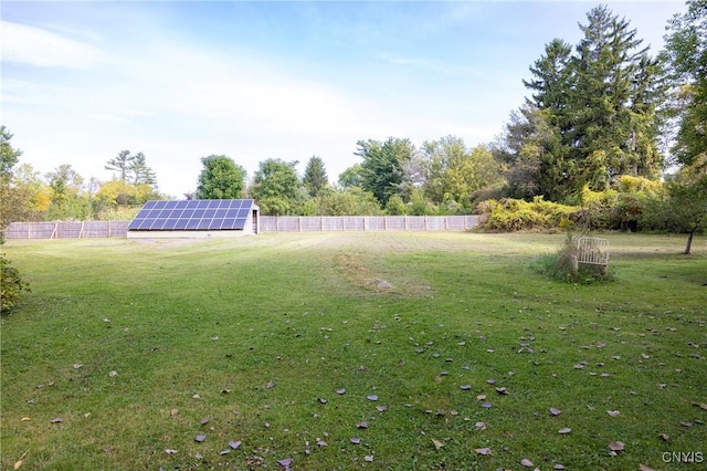 view of yard with view of wooded area