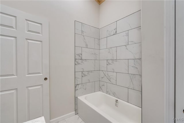 26593 State Route 283, Le Ray, NY 13601 - full bathroom featuring marble finish floors, baseboards, and  shower combination