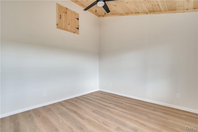26593 State Route 283, Le Ray, NY 13601 - spare room featuring wooden ceiling, a ceiling fan, light wood-style floors, baseboards, and vaulted ceiling