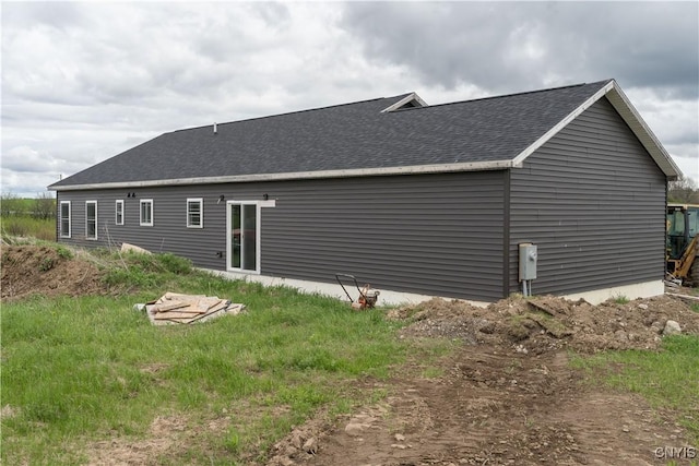 26593 State Route 283, Le Ray, NY 13601 - back of house with roof with shingles