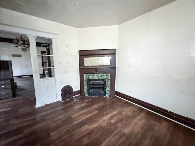 13 Brooklyn St, Rochester, NY 14613 - unfurnished living room featuring a fireplace, wood finished floors, ceiling fan, and baseboards