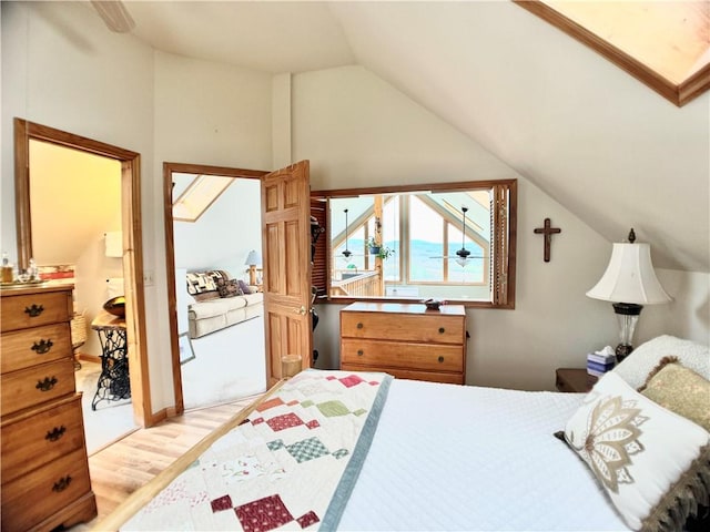 575 Harper Rd, Harpersfield, NY 13786 - bedroom featuring vaulted ceiling and light wood-style flooring