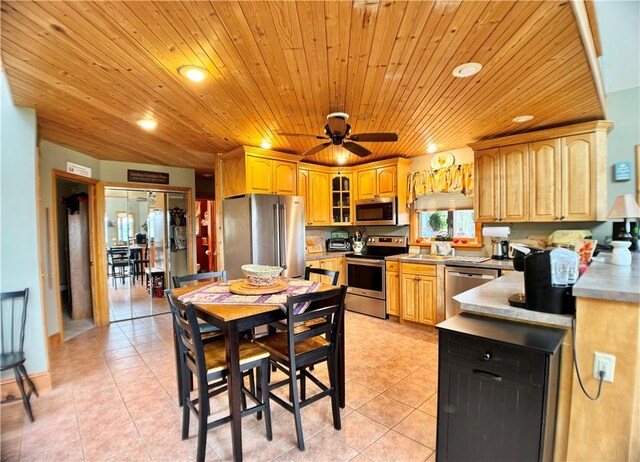 575 Harper Rd, Harpersfield, NY 13786 - kitchen featuring appliances with stainless steel finishes, light tile patterned floors, recessed lighting, wood ceiling, and ceiling fan