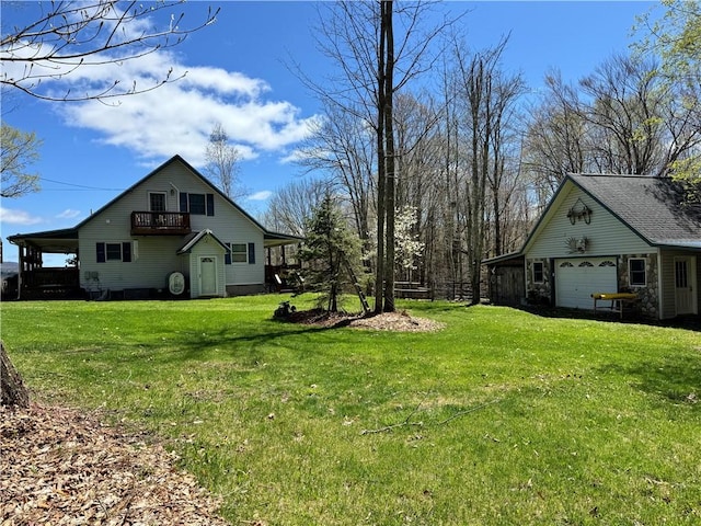 575 Harper Rd, Harpersfield, NY 13786 - view of grassy yard featuring a garage