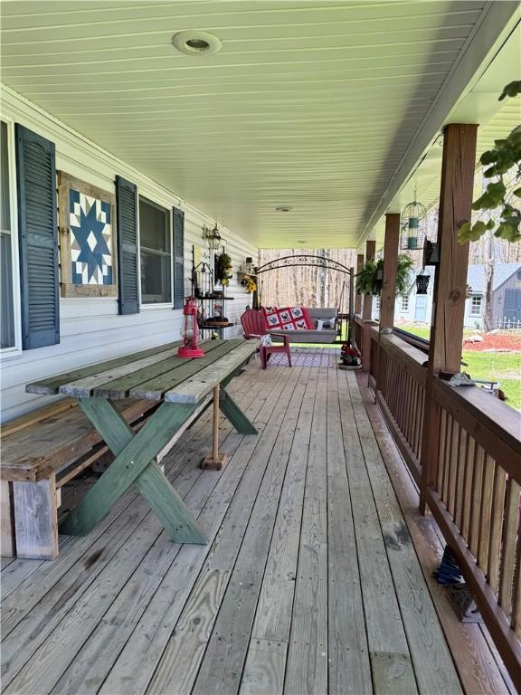 575 Harper Rd, Harpersfield, NY 13786 - deck featuring covered porch