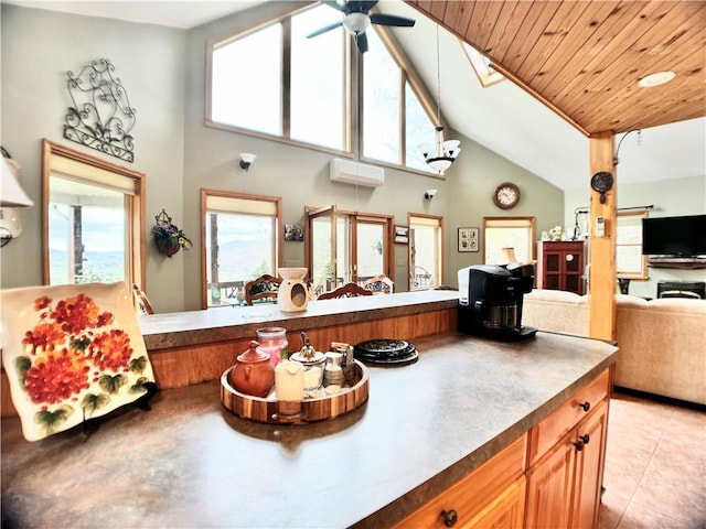 575 Harper Rd, Harpersfield, NY 13786 - kitchen featuring an AC wall unit, high vaulted ceiling, ceiling fan, wooden ceiling, and dark countertops