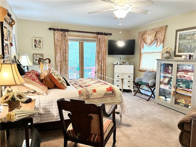 575 Harper Rd, Harpersfield, NY 13786 - carpeted bedroom with multiple windows, baseboard heating, ceiling fan, and access to outside
