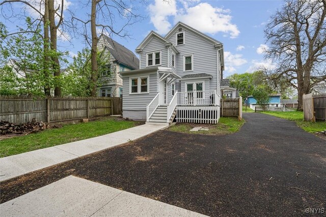 view of front of home with a wooden deck