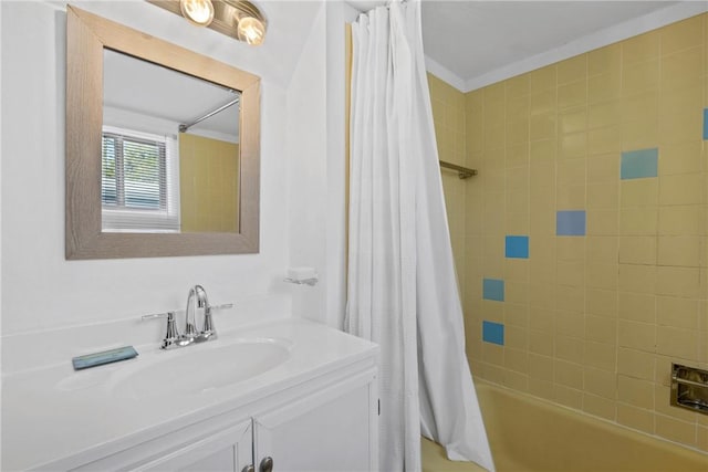 bathroom with shower / tub combo with curtain and vanity