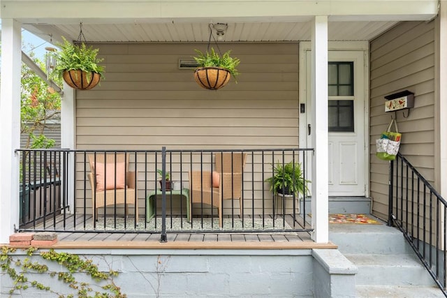 entrance to property with covered porch