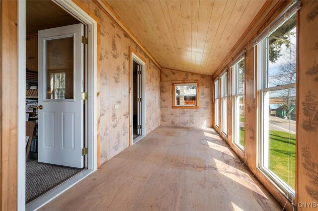 7709 State Highway 28, Exeter, NY 13439 - unfurnished sunroom with healthy amount of natural light and lofted ceiling