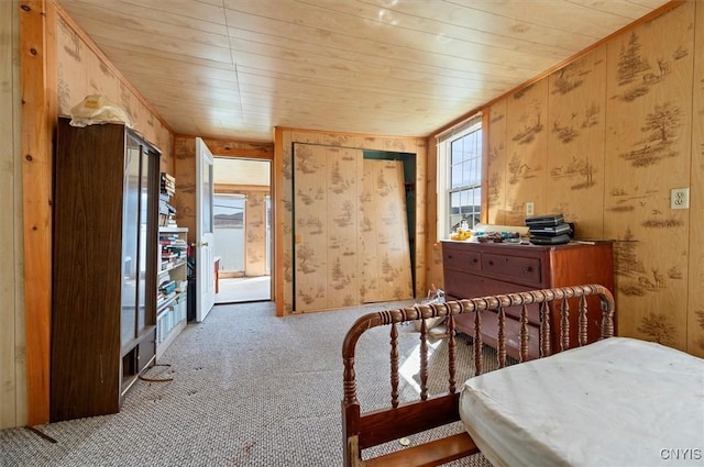 7709 State Highway 28, Exeter, NY 13439 - carpeted bedroom with wood ceiling and wooden walls