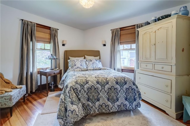 bedroom with light wood-type flooring